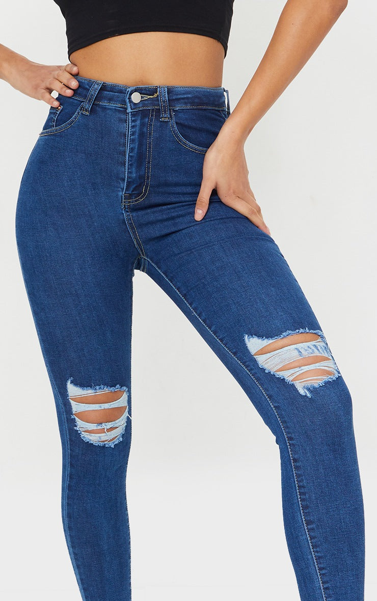 MID BLUE WASH KNEE RIP 5 POCKET SKINNY JEANS